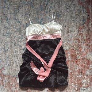 Elegant Black and Cream Dress with Pink Accents